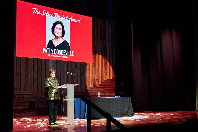 Patty accepting Silver Award